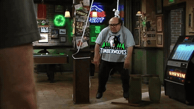 Man In Timberwolves Shirt In Pool Hall GIF