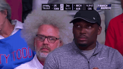 Man In Todd Sweater Watching Game GIF