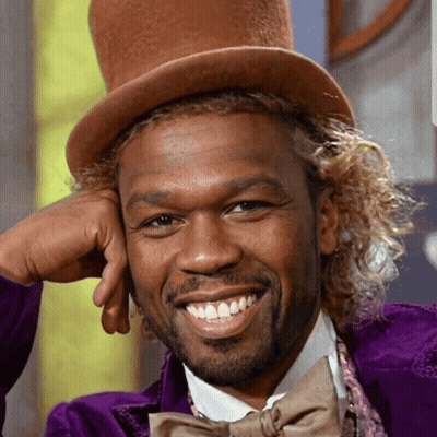 Man In Top Hat And Bow Tie Smiles GIF