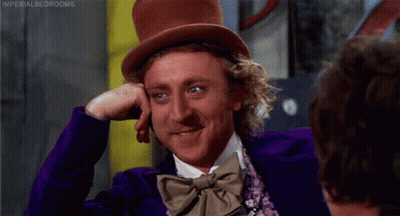 Man In Top Hat And Bow Tie Smiling With Hand On Forehead GIF