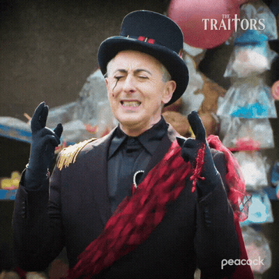 Man In Top Hat And Gloves With Peacock Logo GIF