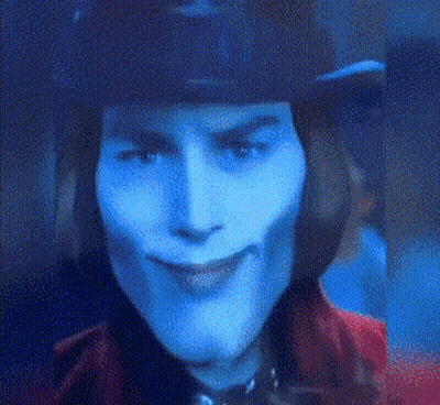 Man In Top Hat And Purple Suit Talking To Another Man GIF
