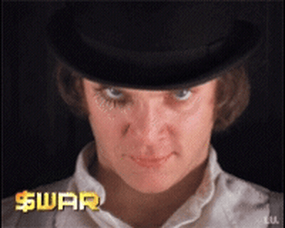 Man In Top Hat And War Shirt GIF