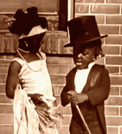 Man In Top Hat And Woman In White Dress GIF