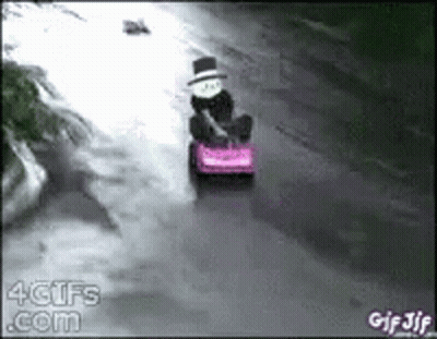 Man In Top Hat Driving Pink Toy Car GIF