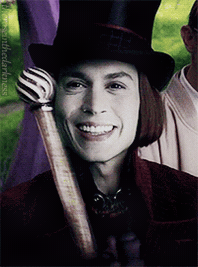 Man In Top Hat Holding Cane Smiles GIF