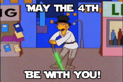 Man in Top Hat Holding Green Lightsaber