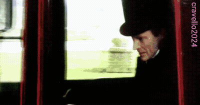 Man In Top Hat Looking Out Window Cradillo2024 GIF
