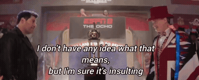 Man In Top Hat Next To Man In Suit Holding ESPN The Ocho Trophy GIF