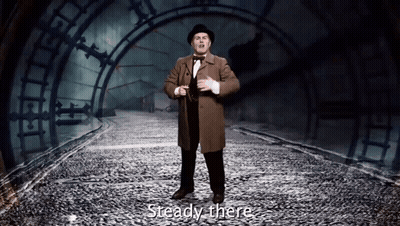 Man In Top Hat Saying Steady There GIF