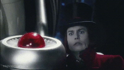 Man In Top Hat Standing Before Movieclips.com Button GIF