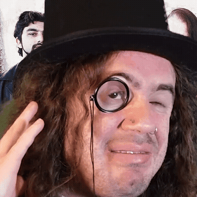 Man In Top Hat With Magnifying Glass GIF