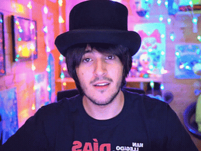 Man In Top Hat With Zaid T-Shirt GIF