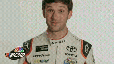 Man In Toyota Racing Suit Making A Face GIF