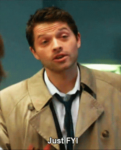 Man In Trench Coat And Tie Saying Just Fyi GIF