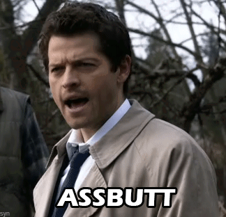 Man In Trench Coat And Tie Says Assbutt GIF