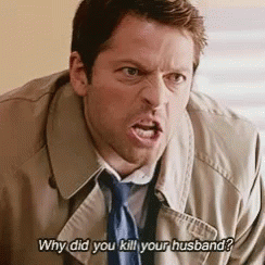 Man In Trench Coat And Tie Screaming GIF