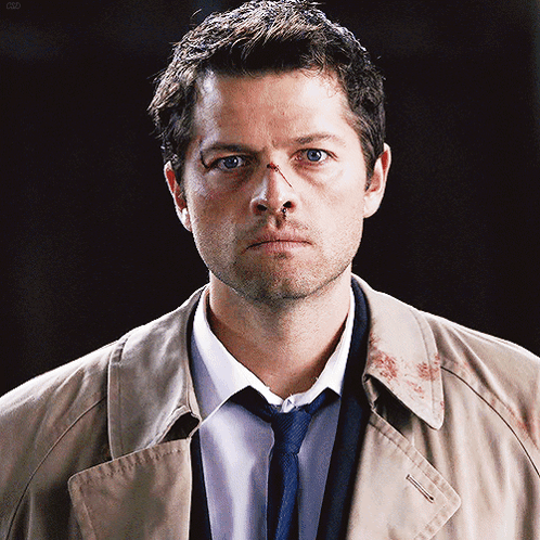 Man In Trench Coat And Tie With Bloody Nose GIF