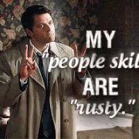 Man In Trench Coat Giving Peace Sign My People Skill Are Rusty GIF