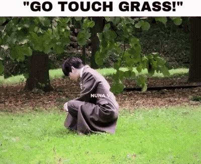 Man In Trench Coat Kneeling In Grass Go Touch Grass GIF