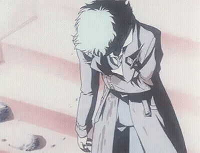 Man In Trench Coat Kneeling On Stairs GIF