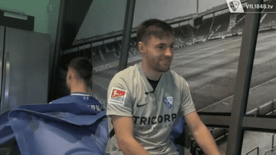 Man In Tricorp Workwear Shirt Sitting In Room GIF
