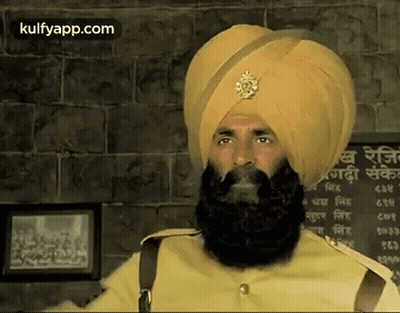Man In Turban And Beard Before Kulfyapp.com Sign GIF