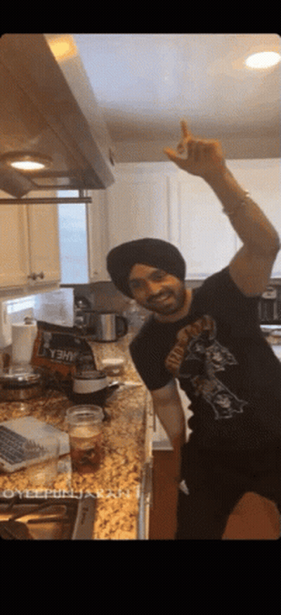 Man In Turban And Black Yeah T-Shirt GIF