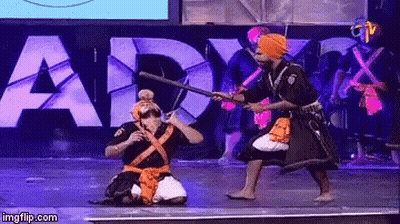 Man In Turban Holding Stick Saying Army GIF
