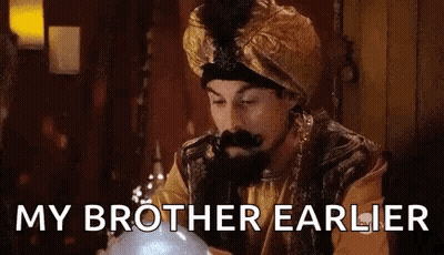 Man In Turban Looking At Crystal Ball GIF