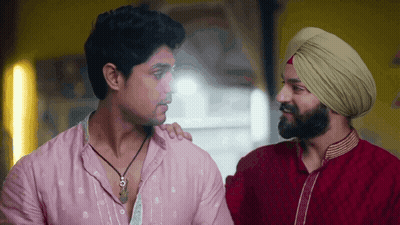 Man In Turban Talking To Another Man GIF