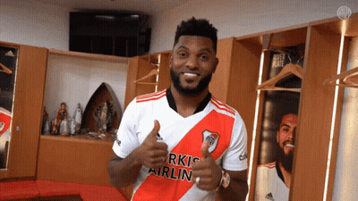Man In Turkish Airlines Shirt Giving Thumbs Up GIF