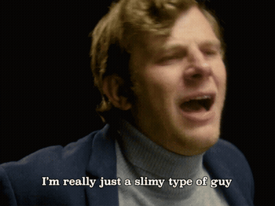 Man In Turtleneck And Suit Saying I'm Really Just A Slimy Type Of Guy GIF