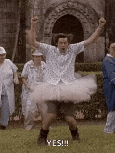 Man In Tutu Dancing In Field GIF