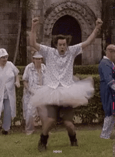 Man In Tutu Dancing In Field GIF