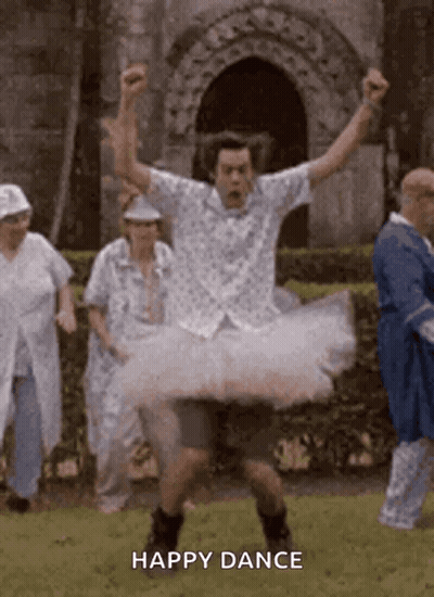 Man In Tutu Dancing In Front Of Elderly Group GIF