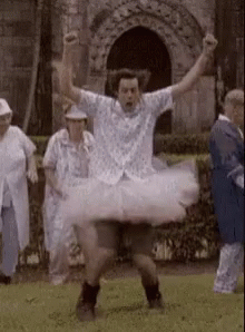 Man In Tutu Dancing In Park GIF