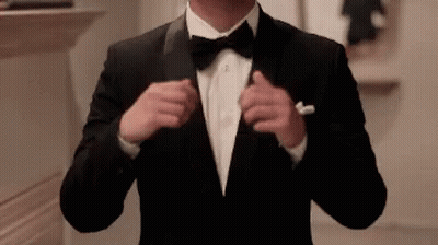 Man In Tuxedo Adjusting Jacket GIF