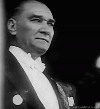 Man In Tuxedo And Bow Tie Black And White GIF