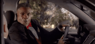 Man In Tuxedo And Bow Tie Driving Car Funny Face GIF