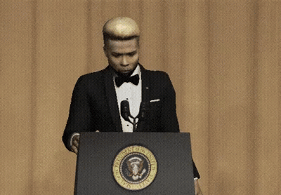 Man In Tuxedo And Bow Tie Giving Speech GIF