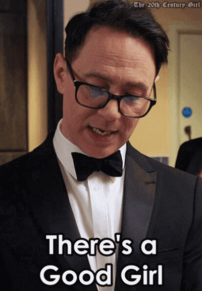 Man In Tuxedo And Bow Tie Saying Good Girl GIF