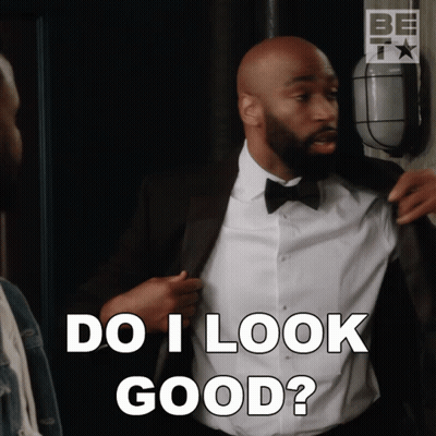 Man In Tuxedo And Bow Tie Says Do I Look Good GIF