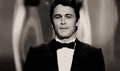 Man In Tuxedo And Bow Tie Smiling GIF
