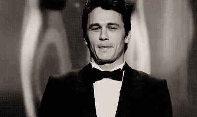 Man In Tuxedo And Bow Tie Smiling GIF