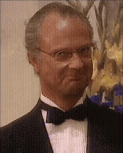 Man In Tuxedo And Bow Tie Smiling GIF