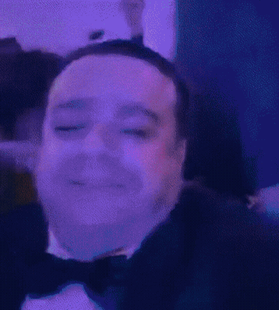 Man In Tuxedo And Bow Tie Smiling GIF