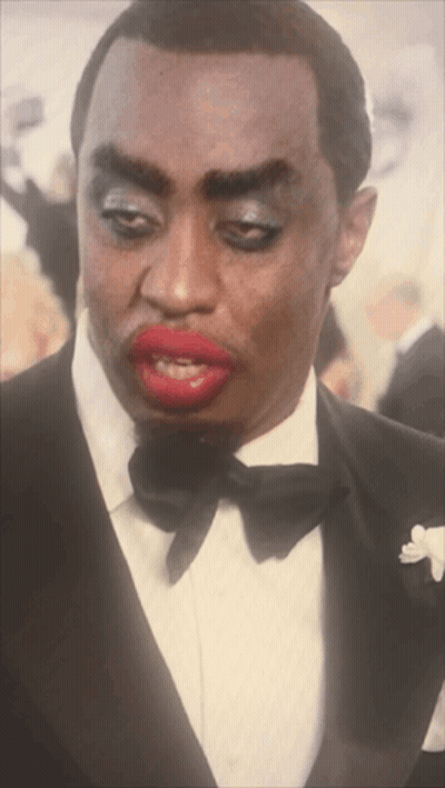 Man In Tuxedo And Bow Tie With Red Lips GIF