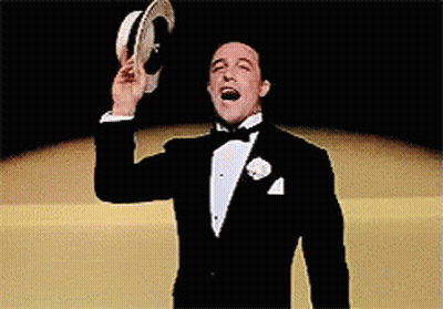 Man In Tuxedo And Hat Pointing And Smiling GIF