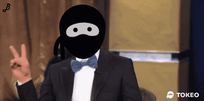 Man In Tuxedo And Ninja Mask Giving Peace Sign GIF